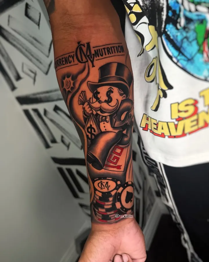 Black and grey tattoo by Dre: money man character, forearm